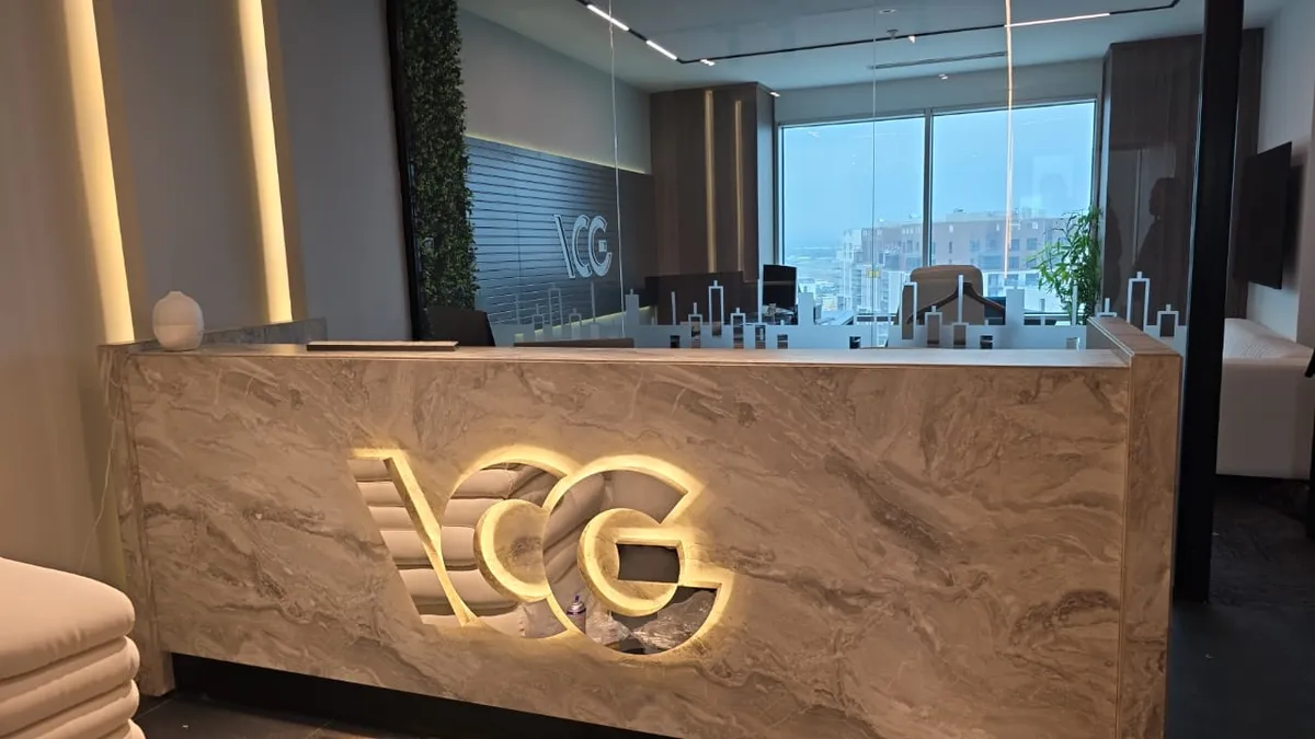 Shopfront signage, façade branding and interior graphics – Brandkom, CMS GROUP